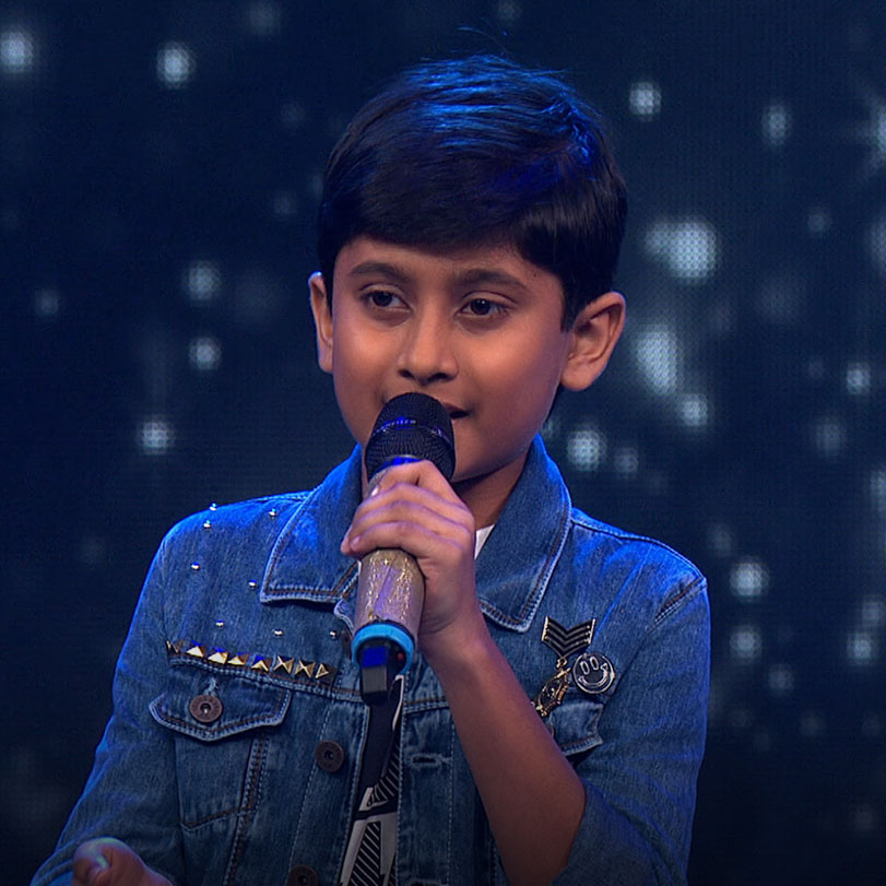 Children from across India participate in a singing competition where 