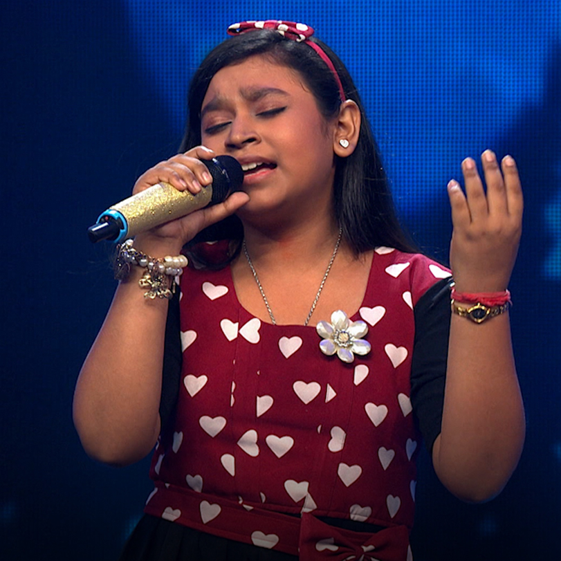 Children from across India participate in a singing competition where 
