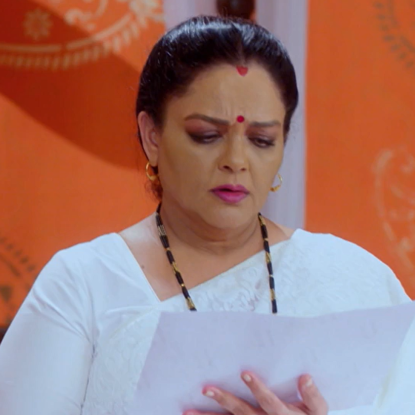 Prakash's mother is trying to get Ajay out of the house because of her