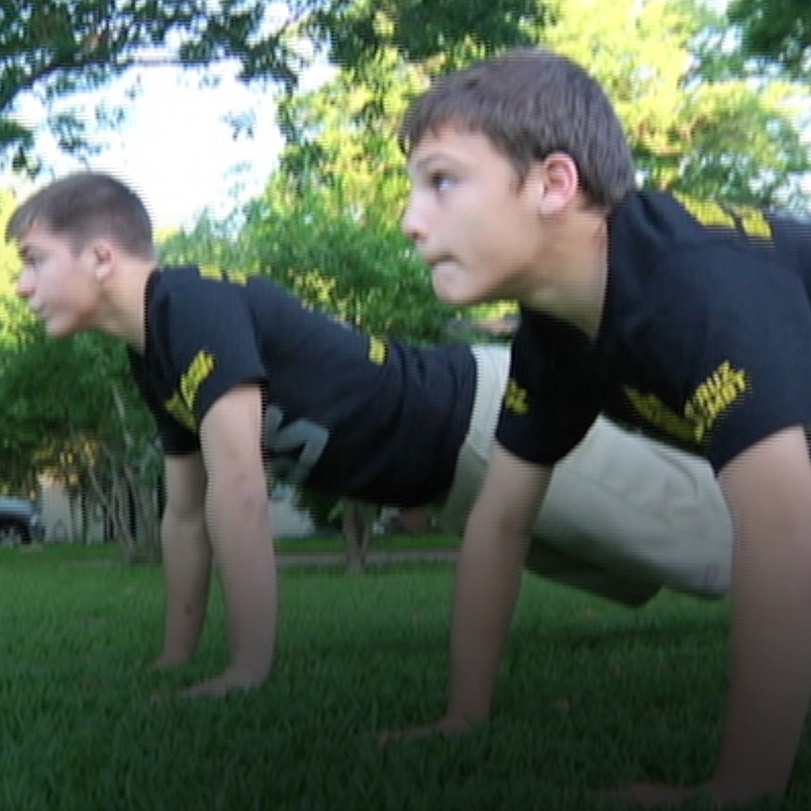 A sports-obsessed parent forces his kids to do a thousand push-ups, ho